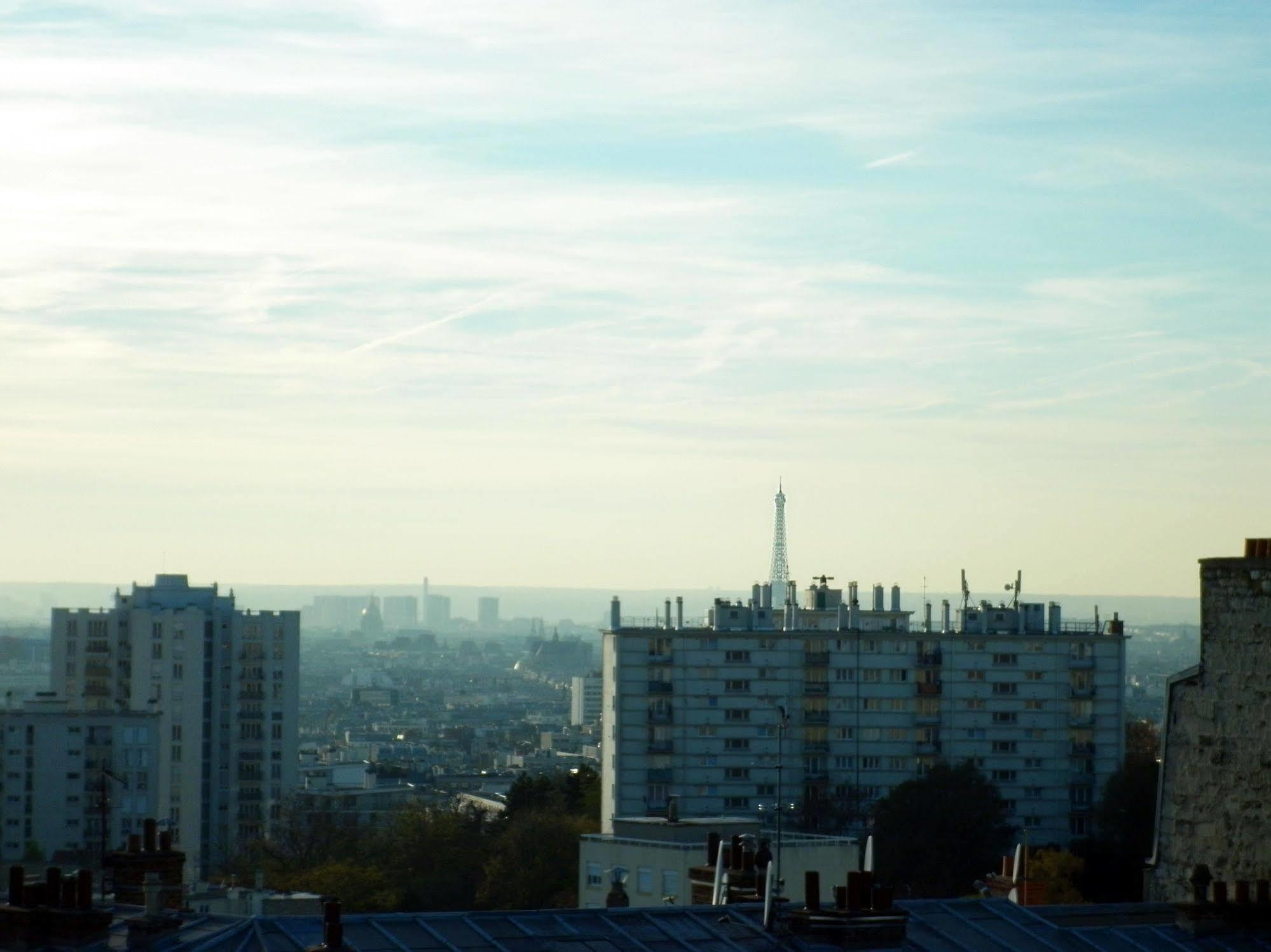 Hotel Ermitage Paris Exterior foto View of Paris from the top of the castle